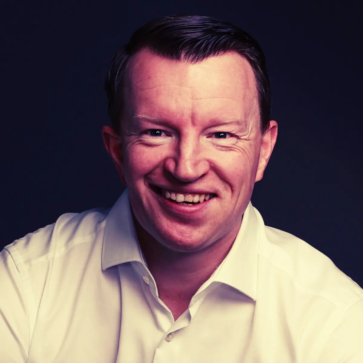 Portrait of b2b sales coach, David White, smiling.